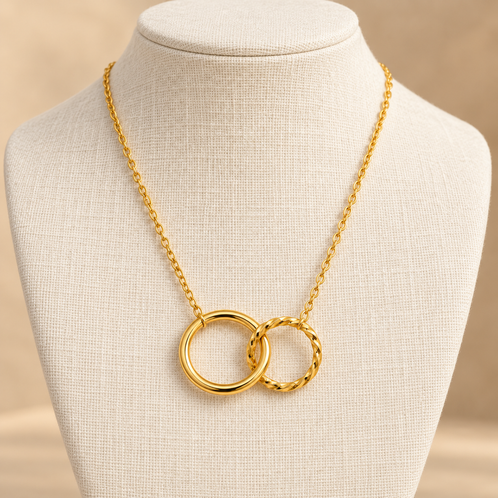 Lía — Collar dorado de aros entrelazados